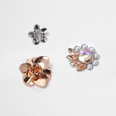 Rose gold and silver tone flower badges
